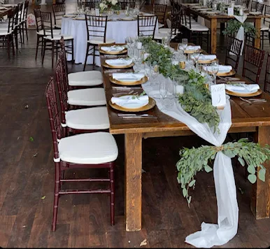 Rustic wedding reception setup catered by Piccolo Trattoria